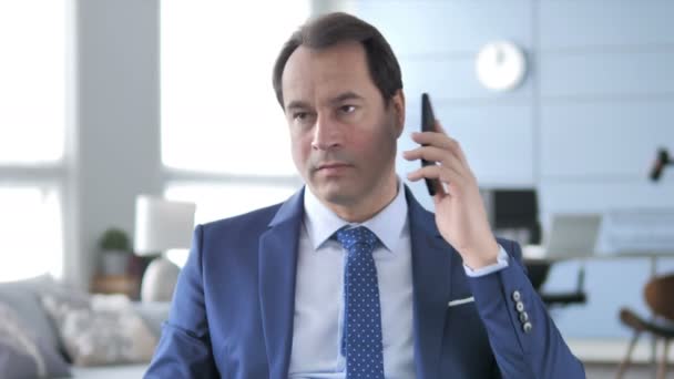 Middle Aged Businessman Negotiating Customer Phone Talk — Stock Video