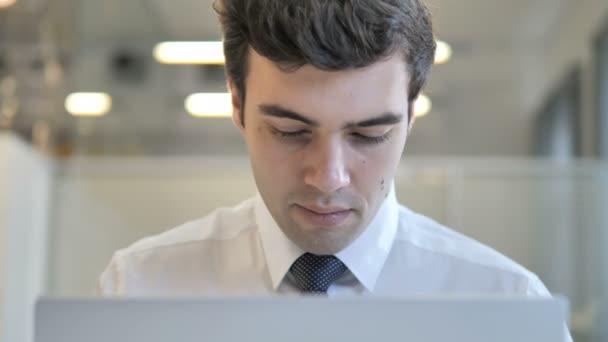 Young Businessman Working On Laptop, Frontal View — Stock Video