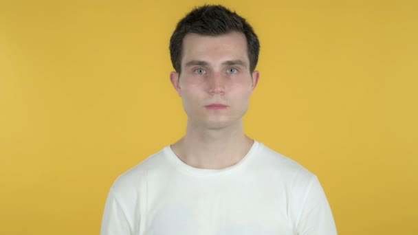 Happy Young Man Isolated on Yellow Background — Stock Video