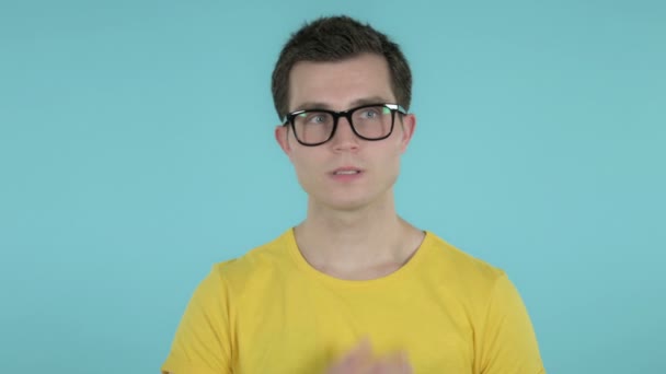 Thinking Young Man Got New Idea Isolated on Blue Background — Stock Video