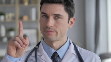 No, Doctor Waving Finger for Rejecting and Denying clipart