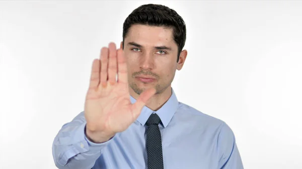 Stop, Joven Empresario deteniéndose con la mano sobre fondo blanco — Foto de Stock