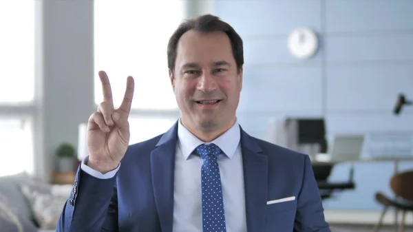 Victory Sign by Middle Aged Businessman — Stock Photo, Image