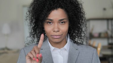 No, African Businesswoman Waving Finger to Reject clipart