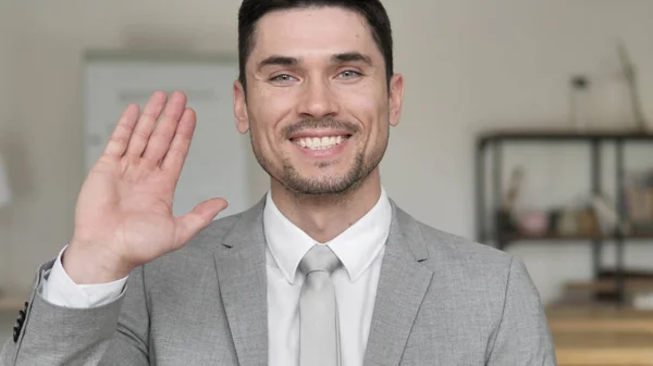 Hello, Businessman Waving Hand to Welcome