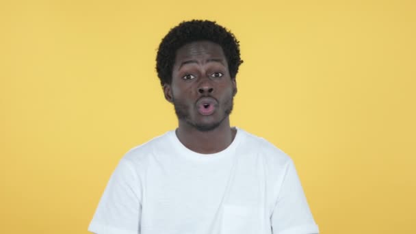 Young African Man Celebrating Success Isolated on Yellow Background — Stock Video