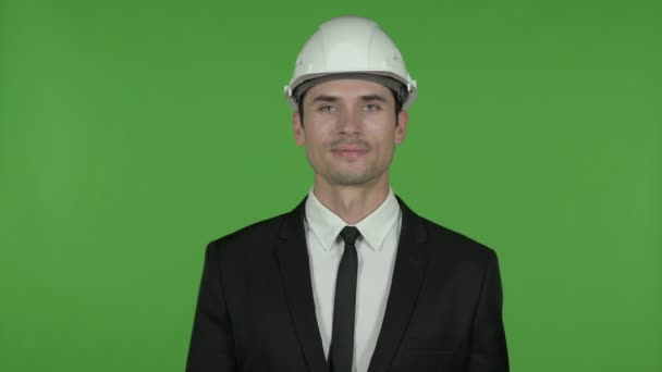 Cheerful Engineer holding Key and Piggy Bank, Chroma Key — Stock Video