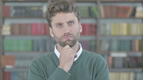 Thoughtful Young Man Thinking about Something — Stock Video