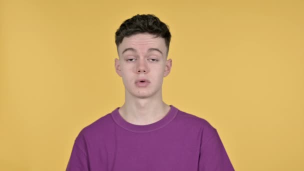 Yes, Young Man Shaking Head to Accept on Yellow Background — Stock Video