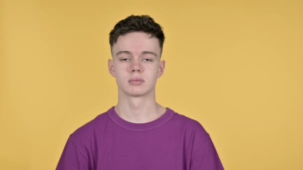 Young Man Gesturing Failure and Problems on Yellow Background — Stock Video