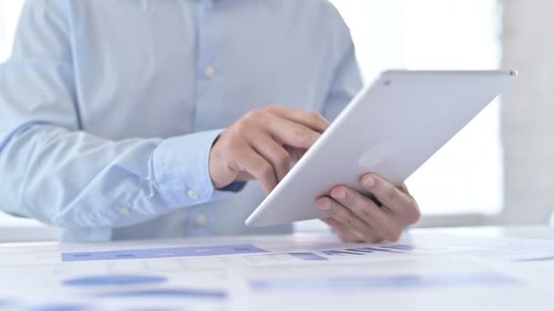Close Up of Young Guy Hands working on Documents and Tablet — Stock video