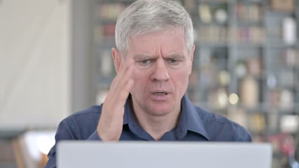 Portrait of Man having Headache while Working on Laptop — Stock Video