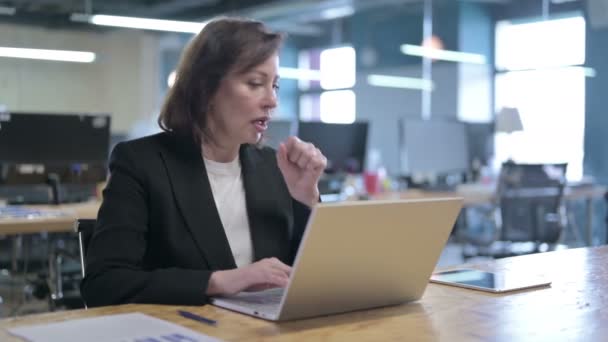 Sick Middle Aged Businesswoman Coughing at Work — Stock Video