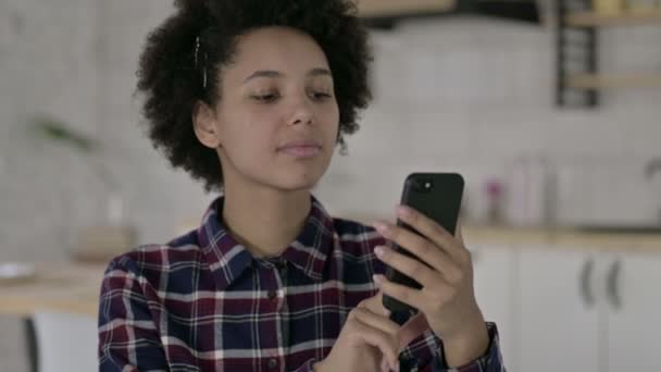 Portrait of African American Woman get Surprise on Smartphone — Stock Video