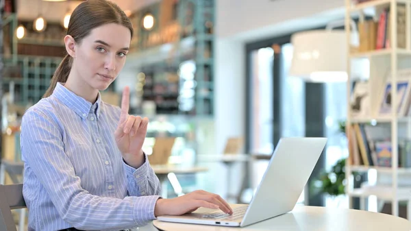 No Sign by Woman using Laptop in Cafe — Stock fotografie