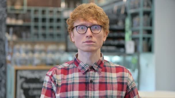 Young Redhead Man Feeling Scared, Frightened — Stock Video