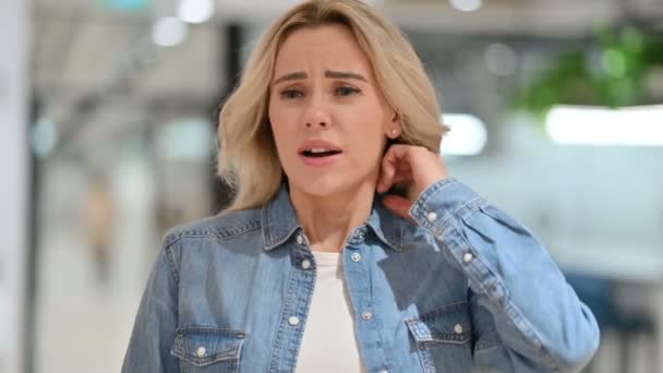Stressed Young Casual Woman having Neck Pain — Stock Video