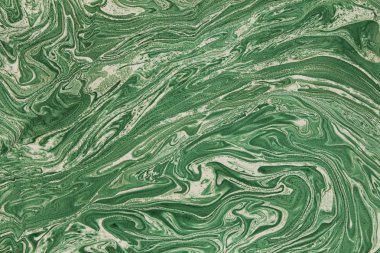 Bulanık yeşil arka plan öğeleri yeşil boya yaymak ve mermer doku etkisi ile