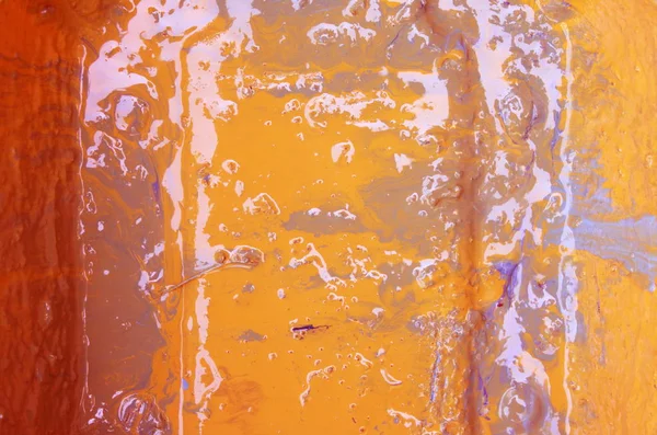 abstract yellow-orange background of orange and yellowoil paints