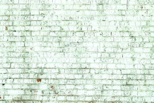 ロフトスタイルの抽象的な背景として緑のレンガ色の古いみすぼらしい壁 — ストック写真