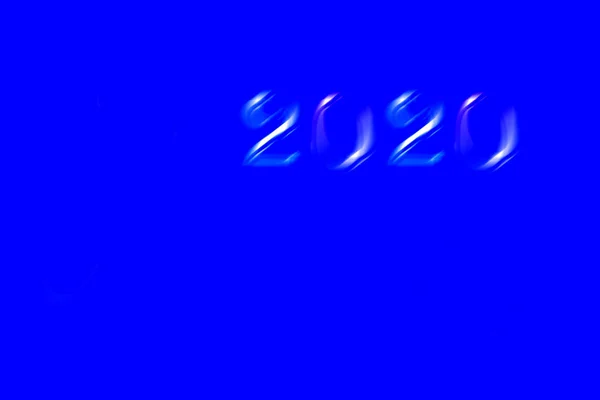 碑文2020と抽象的な青いクリスマスの背景 — ストック写真
