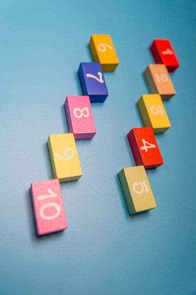 colored cubes with numbers on a blue background