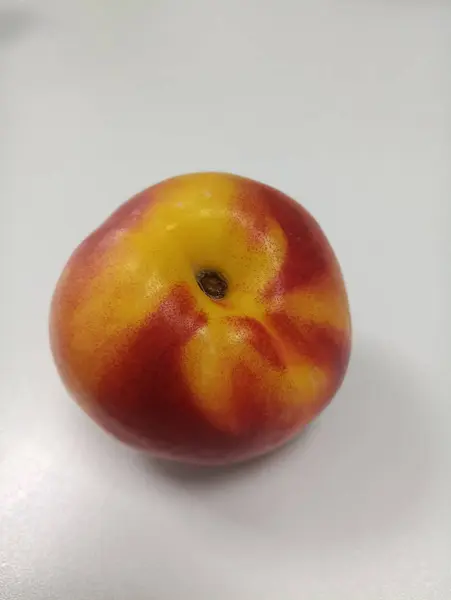 stock image bright juicy tasty nectarine, summer vitamin