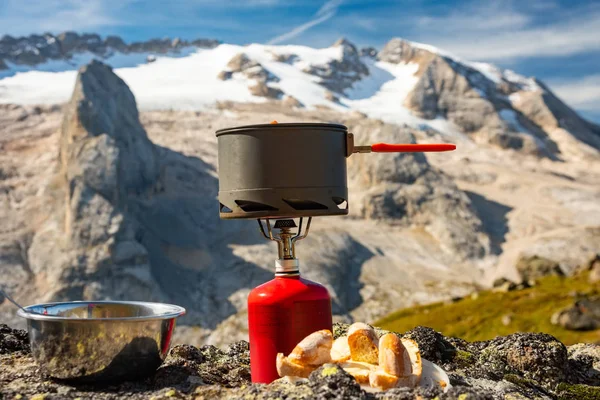 Tourist equipment and tools: camping gas on mountain background