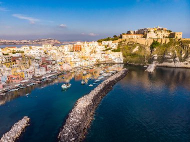 Aerial drone view of Corricella fisherman village in Procida island Naples Italy clipart