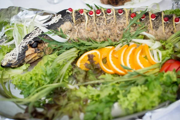 Pike prepared fish and some salads behaind — Stock Image Pike Prepared Fish Some Salads Behaind Royalty Free Stock Photos