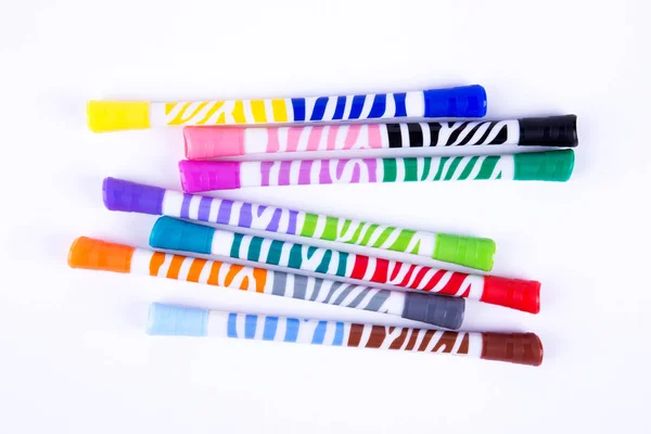 Multicolored markers on white background. Two-sided pens isolate. Extraordinary markers for child