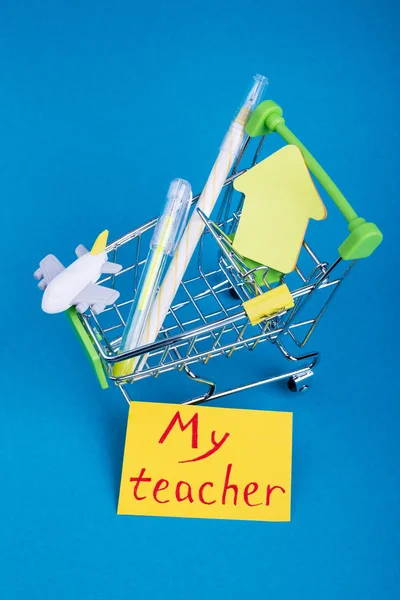 My teacher\'s card and office. Yellow stationery on bright background