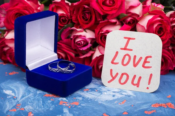 Roses, box with rings, postcard. Bouquet, rings, card I love you