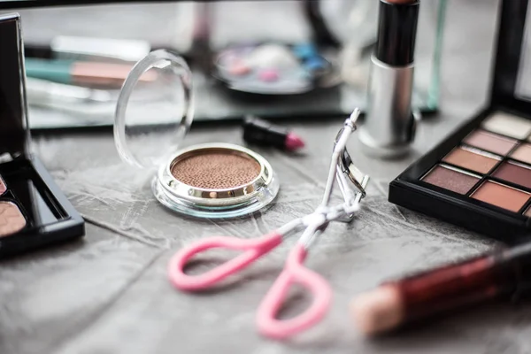 Cosmetics on table, eye shadow close-up