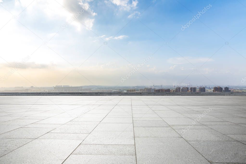 Panoramic skyline and modern business office buildings with empty road,empty concrete square floor