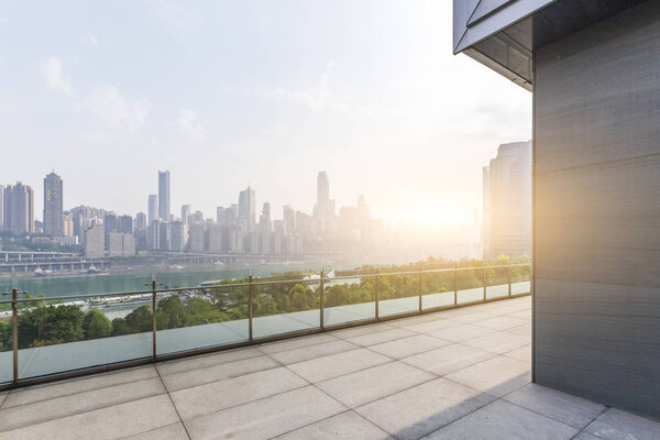 Panoramic skyline and modern business office buildings with empty road,empty concrete square floor