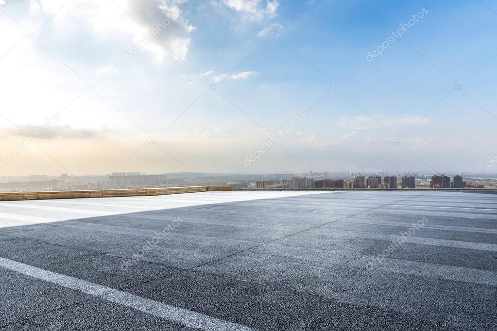 Panoramic skyline and modern business office buildings with empty road,empty concrete square floor