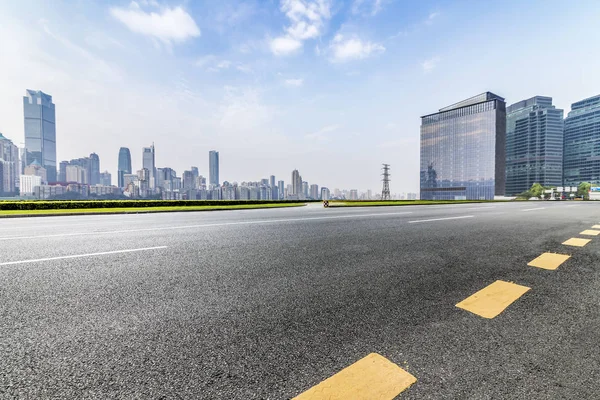 stock image Panoramic skyline and modern business office buildings with empty road,empty concrete square floor