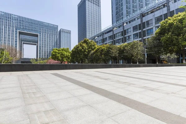 Empty Road with modern business office building,empty floor