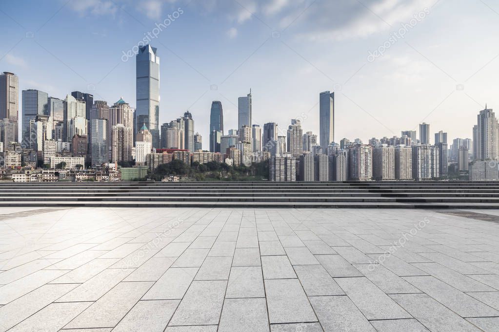 Panoramic skyline and modern business office buildings with empty road,empty concrete square floor