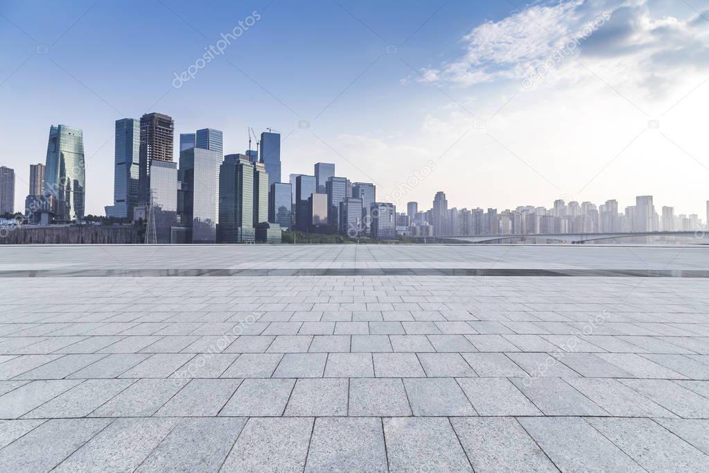 Panoramic skyline and modern business office buildings with empty road,empty concrete square floor