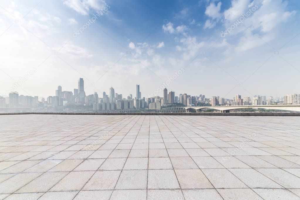 Panoramic skyline and modern business office buildings with empty road,empty concrete square floor