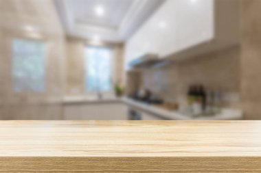 empty wooden table top and blur interior background 