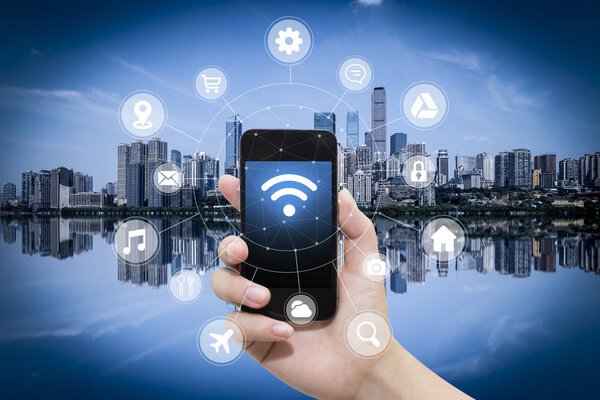 smart phone in hand and using internet wifi network connection c