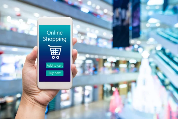 Smart phone online shopping in woman hand. Shopping center in ba — Stock Photo, Image