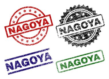 Nagoya pullar sıkıntı doku ile kapatın. Siyah, yeşil, kırmızı, mavi vektör kauçuk kirli doku ile Nagoya resim yazısı olarak yazdırır. Lastik conta ile yuvarlak, dikdörtgen, madalyon şekilleri.