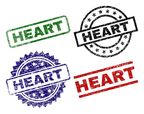 Sellos de sello de corazón texturizado Grunge — Vector de stock