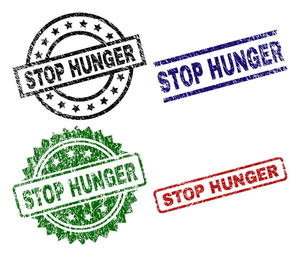 Sellos de sello Dañado Texturizado STOP HUNGER — Archivo Imágenes Vectoriales