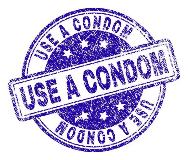 Grunge texturerat Använd A kondom stämpelplatta — Stock vektor