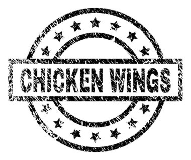 Damga mühür çizilmiş dokulu tavuk kanatları